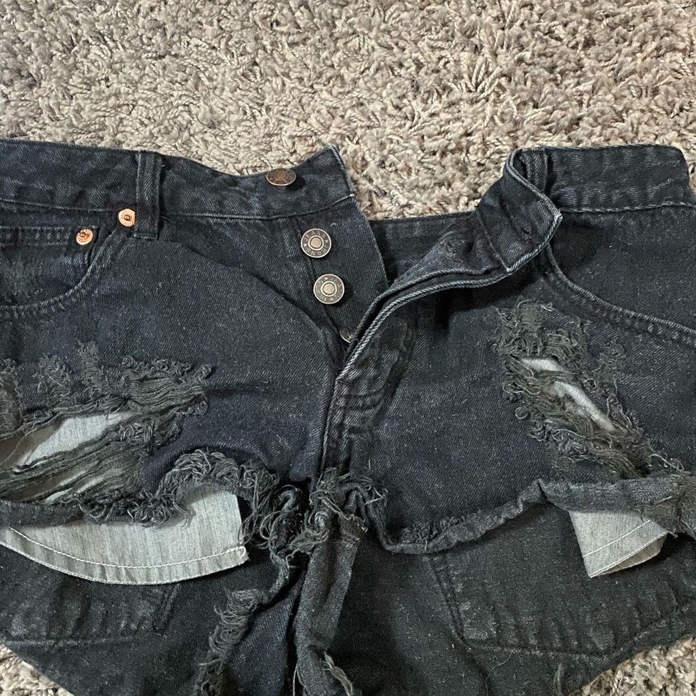 Black ripped jean shorts